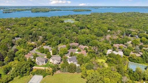 This aerial shot highlights the neighborhood’s proximity to local parks and the shimmering waters of Lake Minnetonka.