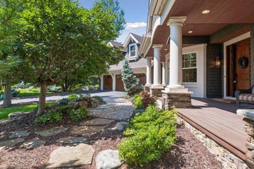 A thoughtfully landscaped front yard adds charm and curb appeal from the moment you arrive.