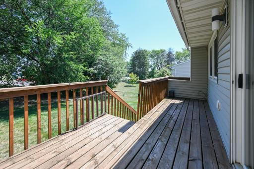 Nicely sized cedar deck with a perfect spot for a grill