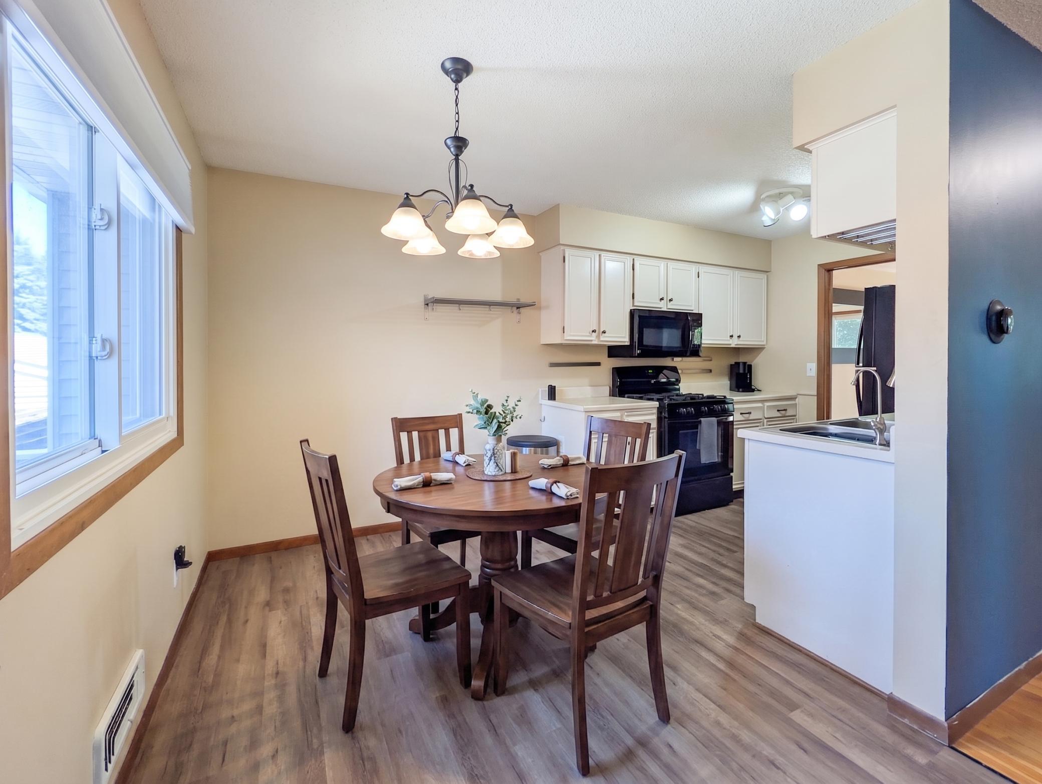Informal dining area attached to the kitchen (virtually staged)