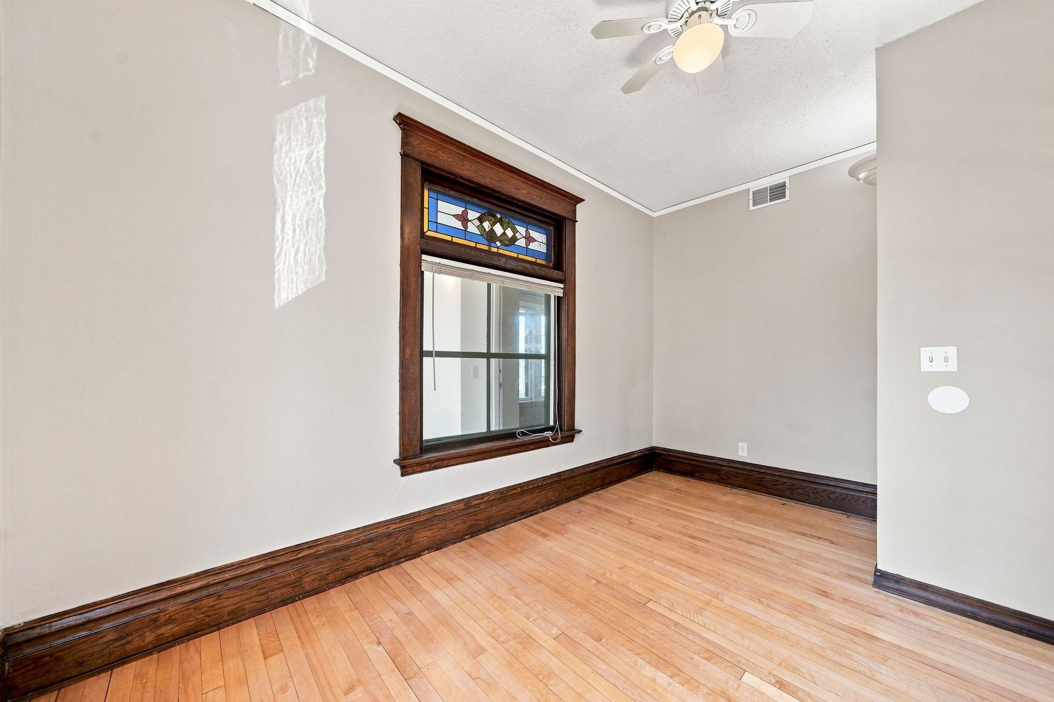 Upper level front window