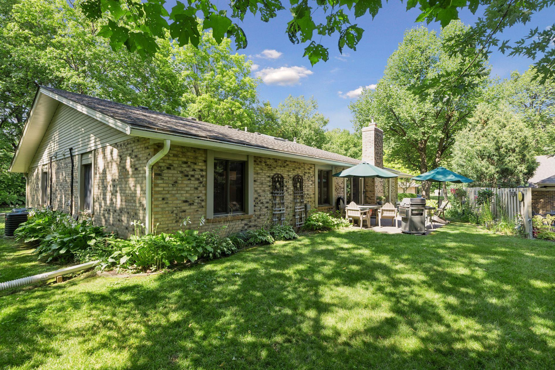 This home enjoys an 18+x12+ private patio space