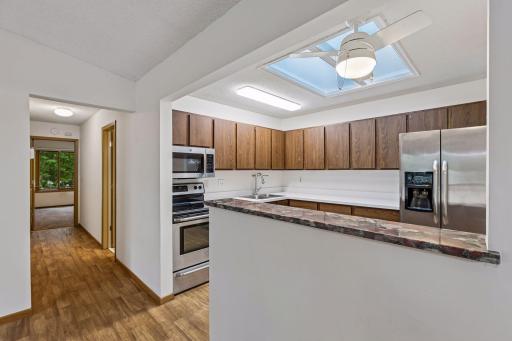 Breakfast bar, newer appliances and great counter space
