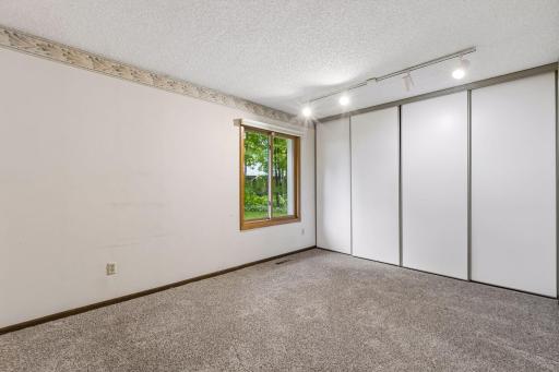 2nd Bedroom with wall of closets