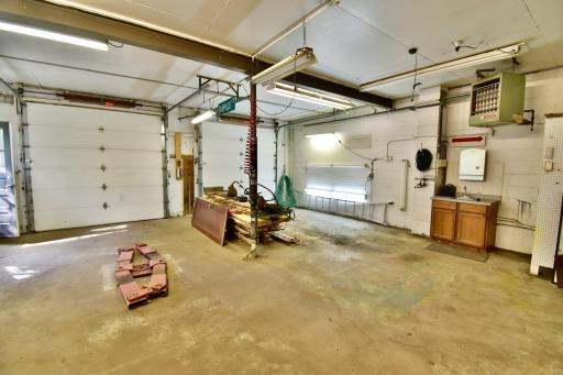 There is a bathroom in this heated detached garage so you never have to leave!