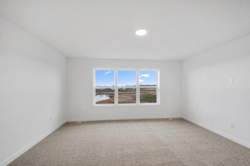(Photo of a similar home, actual finishes may vary)