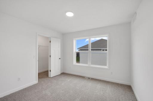 (Photo of a similar home, actual finishes may vary)