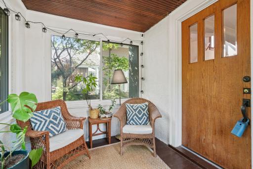 Sweet screened porch on the front of the house.
