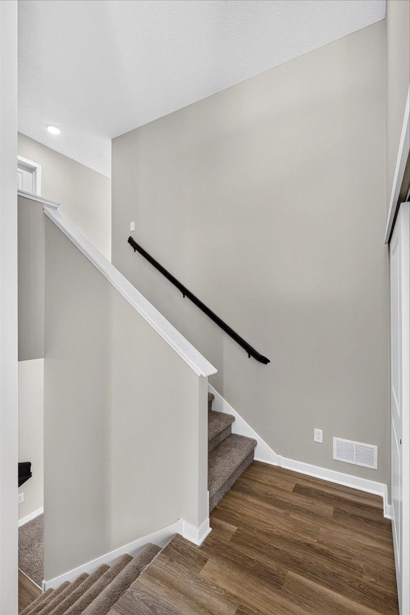 Foyer. Photo taken of another home with similar plan and finishes.