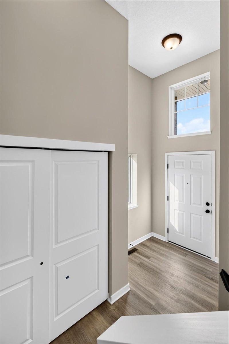 Foyer. Photo taken of another home with similar plan and finishes.