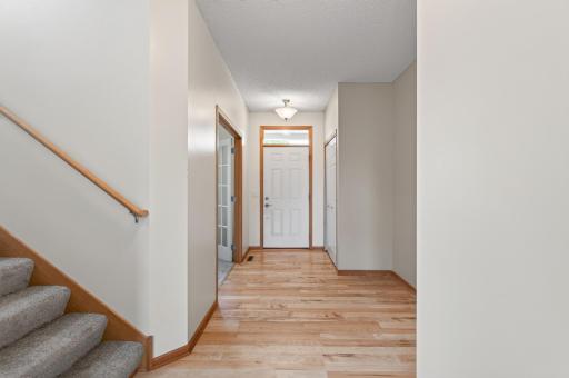 Entryway with closet and features cut out to the right for creating a functional grab and bo area