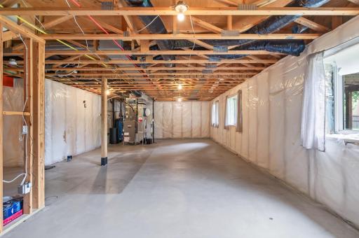 Full Basement with 3 Daylight window and floor trusses for easy flaat ceiling finishing.