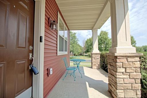 Enjoyable Front Porch with Table and Chairs