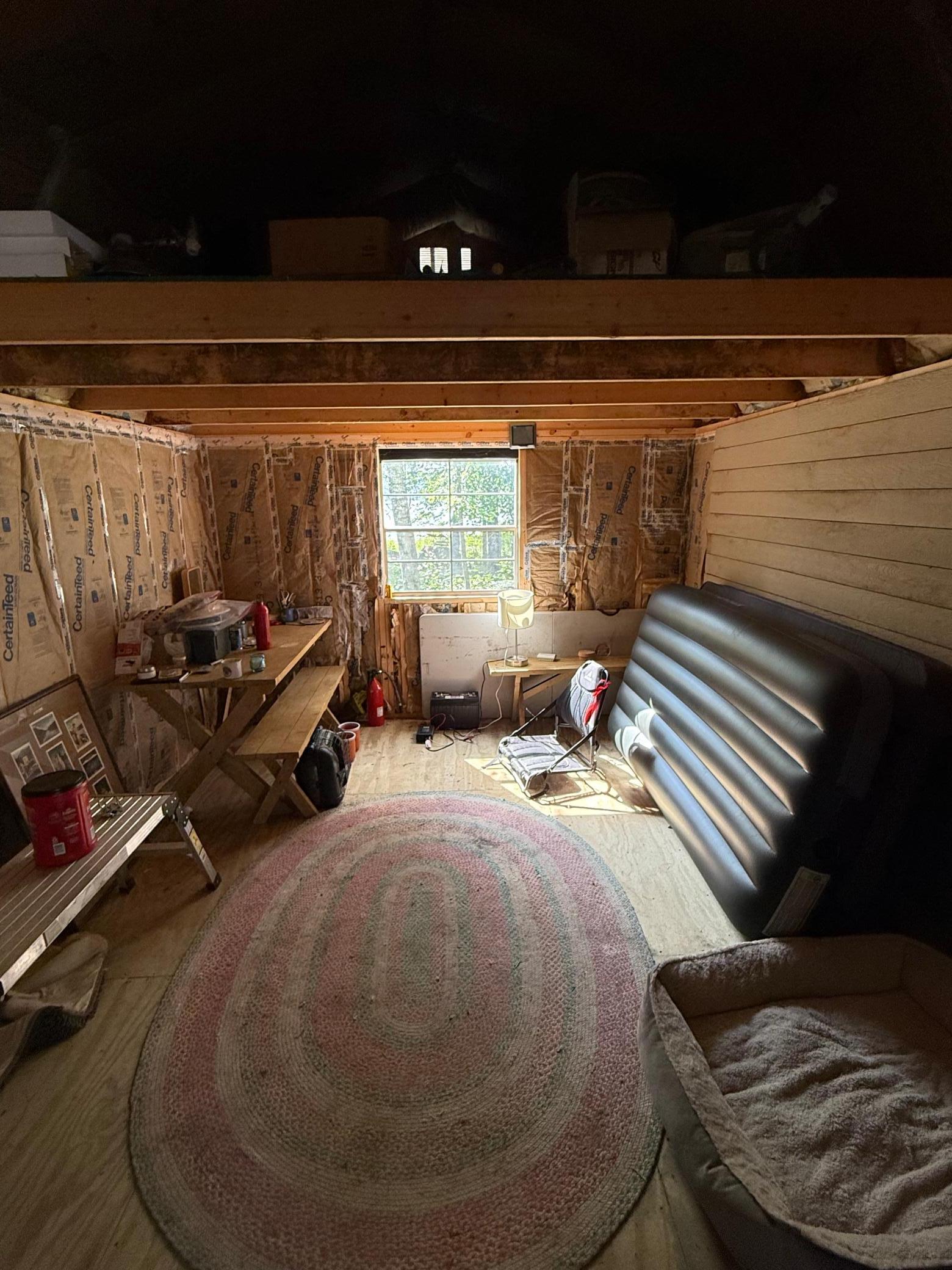 Cozy shed converted to off grid cabin