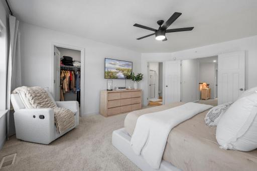 The primary suite includes a large walk-in closet and private bath, keeping everything conveniently together in your own comfortable retreat