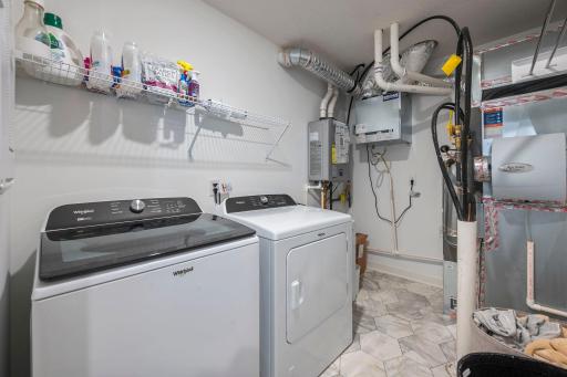 Convenient upper level laundry room makes laundry days a breeze