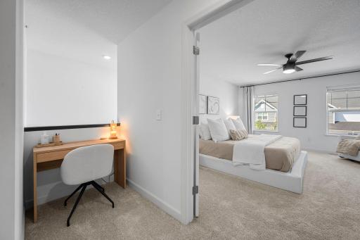 A handy little nook just outside the primary bedroom makes a great spot for a home office or workspace