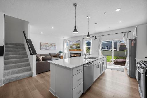 Bright, open, and easy to enjoy—the kitchen overlooks the living area and backyard, bringing together some of the best parts of the home