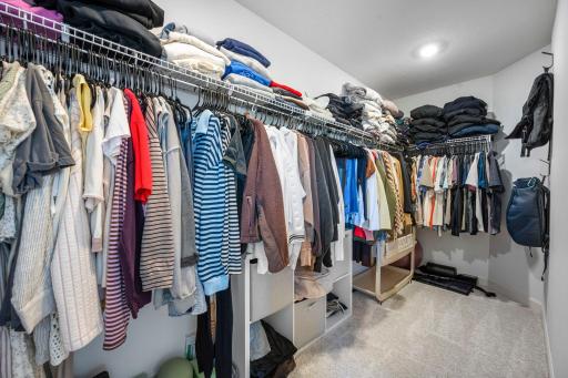 The spacious walk-in closet gives the primary suite plenty of room to keep clothing, shoes, and everyday essentials neatly organized