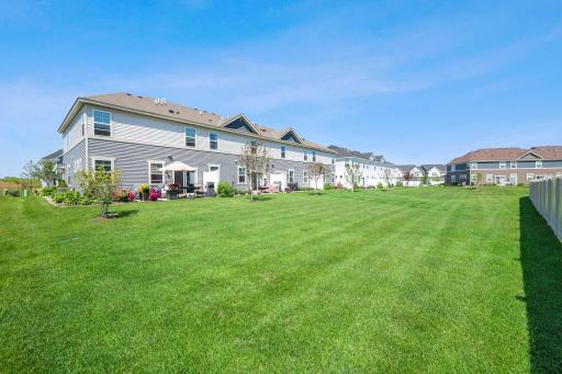 Another great view of the expansive shared green space—a wonderful extension of the backyard setting