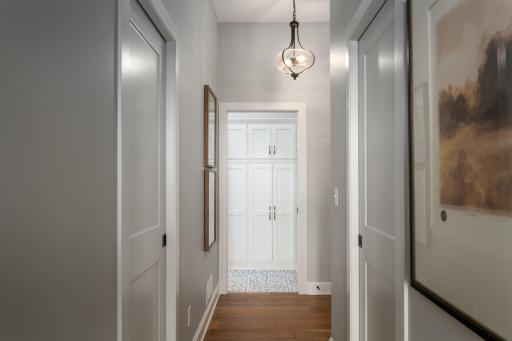 Primary walks through his and her walk-in closets, measuring 7x8 and 8x9, separate from the bathroom.