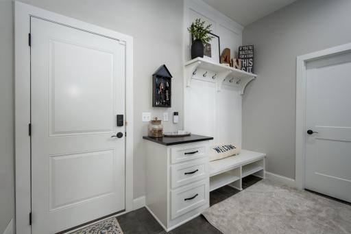 Mudroom off the garage access, storage closet, and more.