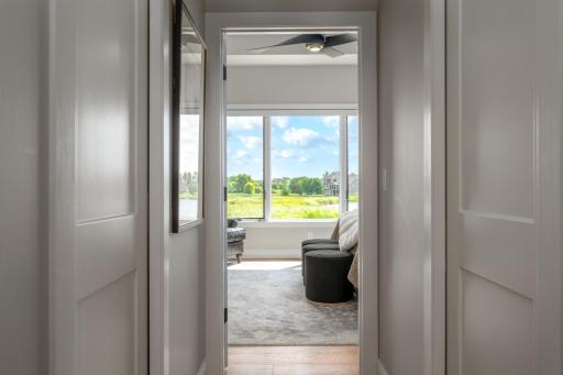 Separate closets lead to the primary suite