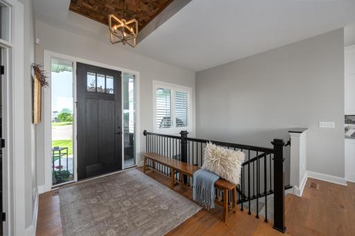 7x13 warm and inviting foyer with architectural finishes.