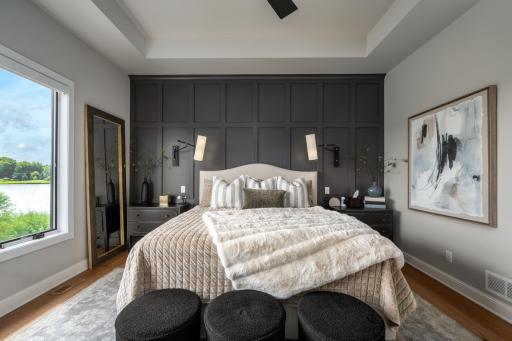 Floor-to-ceiling enameled flat-paneled wainscoting feature wall.