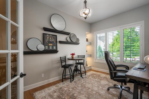 Bright west-facing main-level office with built-ins.