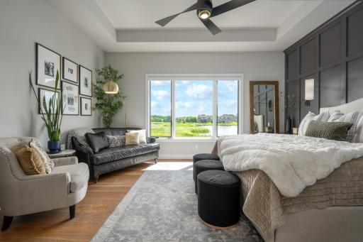 Owners' wing, located on the south side of the home, continues the Shaw flooring and oversized windows of the watershed with remote-control blinds.