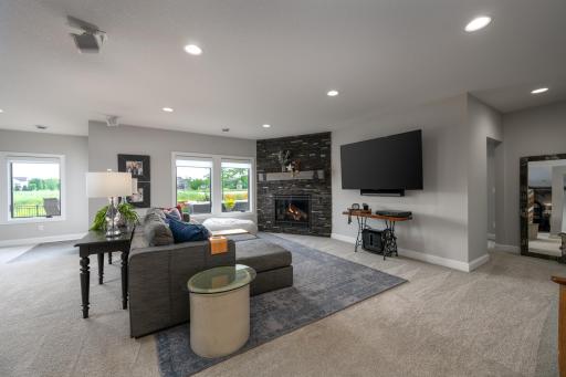 Walk out lower level with 3 bedrooms, a large family room, game area, full bath, and wet bar.