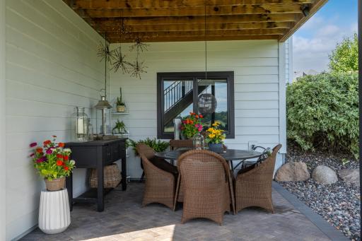 Covered patio space with electrical and easy access to water for a future hot tub.