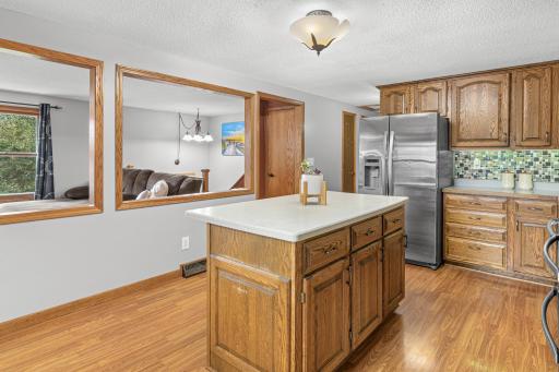 An open connection makes entertaining from the kitchen easy.