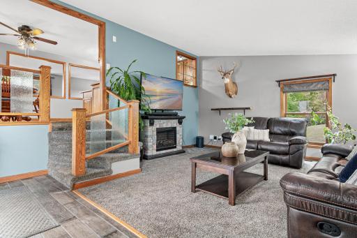 A separate family room with a fireplace gives you another place to gather and relax.