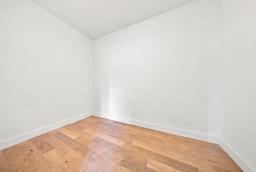 Walk-in closet in primary bedroom suite