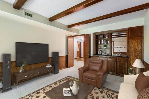 5601 Dewey Hill Road - Den has a wet bar, built-in shelving and French doors - Can be used as guest bedroom (virtually staged)