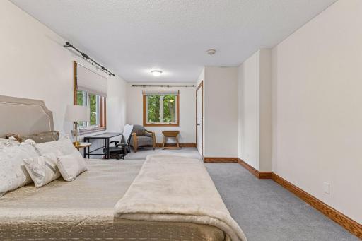 Third bedroom on upper level with ample space for living room or office space