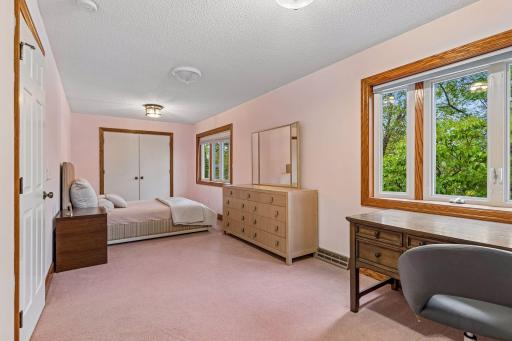 Spacious secondary bedroom includes double doors to closet and ample space for desk or playroom