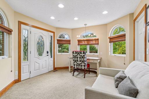 Just off the kitchen and the back of the home is a prestigious office with exterior access to backyard and large walk in closet