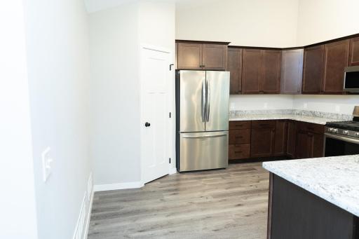 Plenty of room and a pantry behind the door.