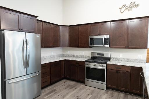 Beautiful cabinetry, counters, and floors