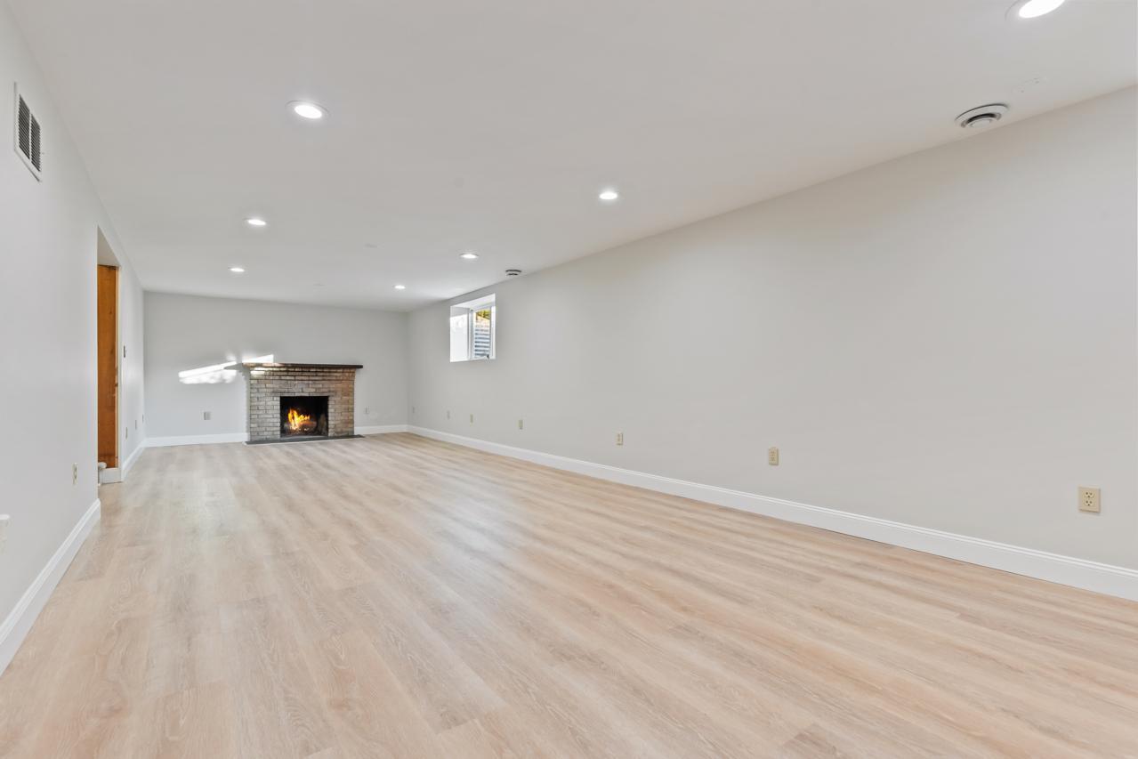 Lower level living room with new LVP flooring