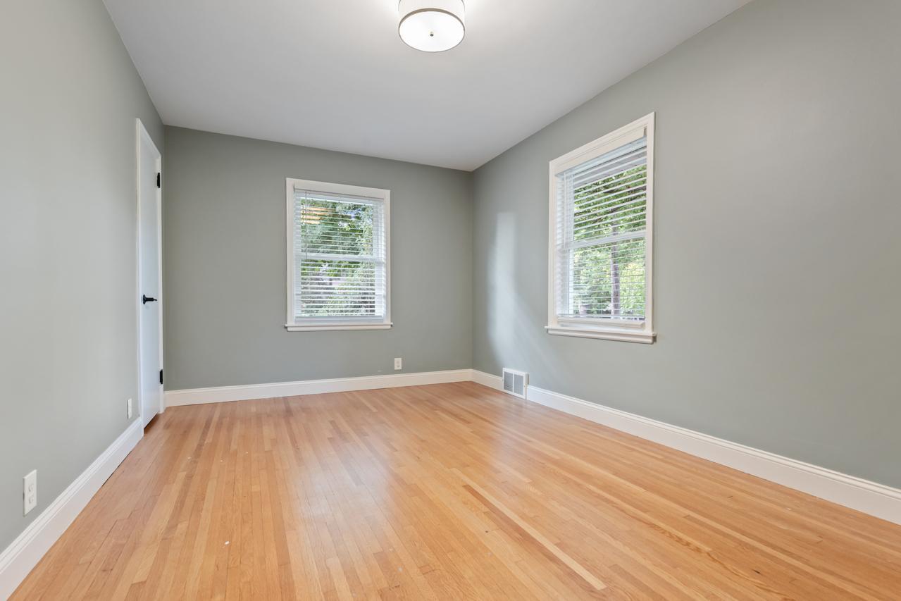 Main level primary bedroom with two closets