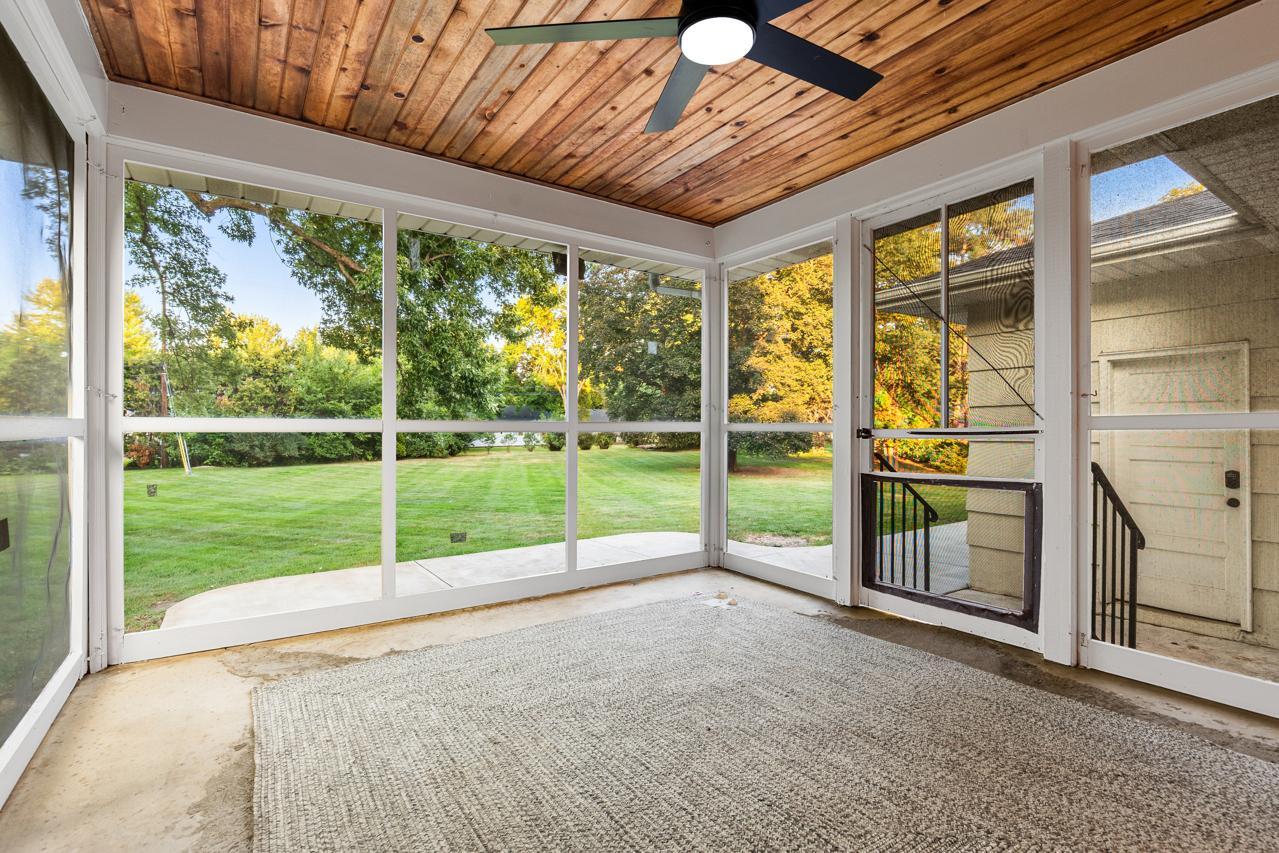 Screened porch overlooking spacious yard
