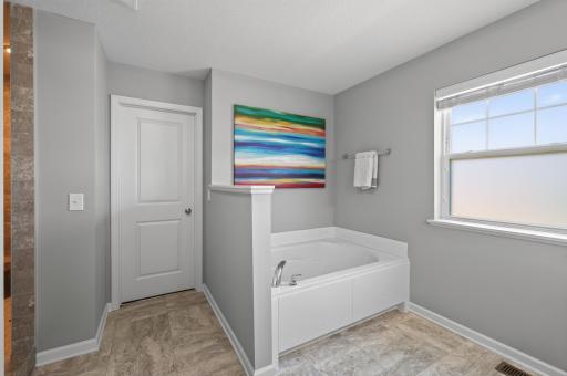 Relax in the ensuite soaking tub