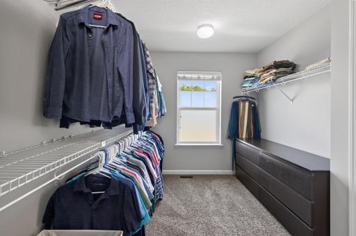 Generous primary walk-in closet