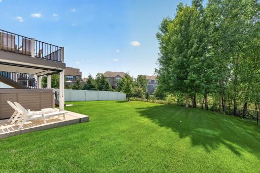 Fully fenced backyard with lots of green space to enjoy