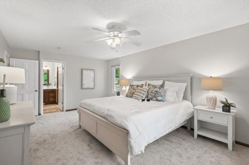 Private primary suite with its own bath and walk-in closet