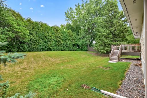 Lush greenery creates a private oasis right outside your door